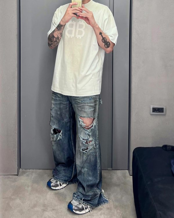 隐藏涂染脏脏破洞牛仔长裤